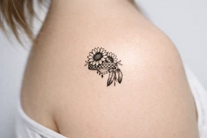 sunflowers with feathers and female Indian headband ribbon tattoo idea