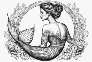 Draw a mermaid body with nice long fish tail with a shell bra tattoo idea