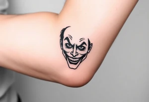 poker joker face tattoo idea