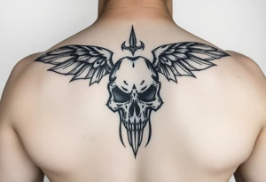A tribal be with a skull for lower abdomen on a man tattoo idea