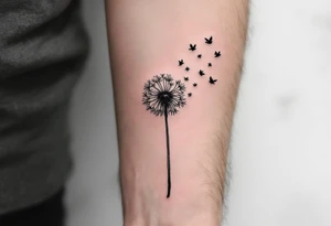 A dandelion with its leaves blowing away and turning into birds tattoo idea