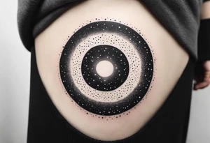 simple minimalist galaxy design in a circle tattoo idea