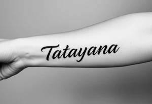 Tattoo for a man that says the name “Tatayana” tattoo idea