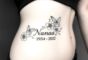 flowers and butterflies with the name “NANA” and the date “1954-2022” mixed all together on the side of the rib cage tattoo idea