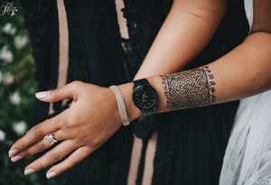 A forearm tattoo on the front of the forearm with the writing "فَأَيْنَ، يَا مَوْتُ، شَوْكَتُكَ؟ وَأَيْنَ، يَا مَوْتُ نَصْرُكَ؟ " tattoo idea