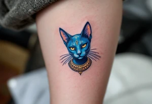 A cobalt-blue Bastet cat with gold earrings and collar, radiating mystery and protection. tattoo idea