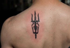 barefeet behind trident tattoo idea