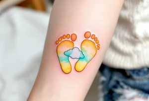 Bright yellow and mint green footprints of Roman, accompanied by a playful cloud, representing his free spirit. tattoo idea