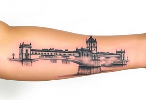 A realistic Charles Bridge silhouette, with fog rolling over the Vltava River, using soft grayscale shading with a hint of blue. tattoo idea