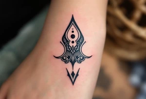 A comma with a dot above tattoo idea