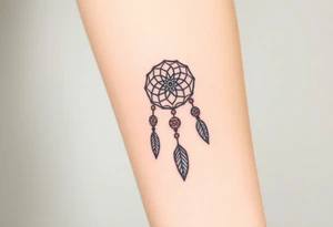 native dreamcatcher with flowing feathers and sacred beads tattoo idea