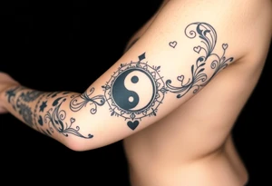 Magestic symbol combining ying yang, Gemini zodiac symbol, spiral Paisleys, and hearts tattoo idea