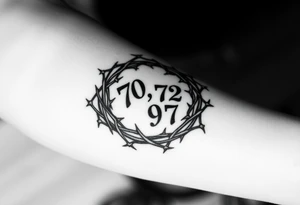 Wreath of thorns with barbed wire and in the center of the wreath in Old English numbers 70, 72, 97 tattoo idea
