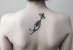 hand letting go kite tattoo idea