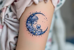 A crescent moon in silver with a mother and child nestled inside, surrounded by tiny gold stars, represents nighttime care and dreams. tattoo idea