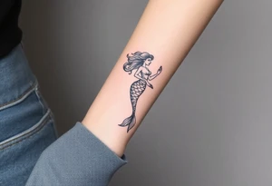 Realistic tattoo on forearm of a mermaid tattoo idea