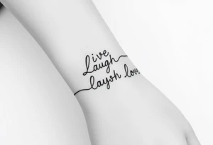 Live laugh love tattoo thats a bracelet that wraps around very dainty tattoo idea