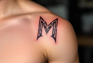 A tribal-inspired "M" in dark chestnut brown, featuring angular patterns. tattoo idea