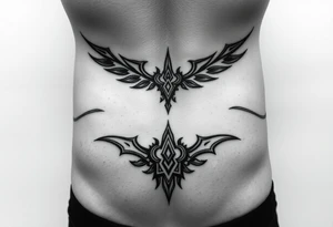 Each tribal piece for below the belly button on a male that runs from hip to center of the groin kind of Gothic eclectic just nice tattoo idea