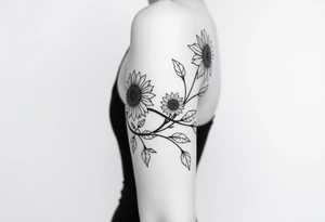 Dainty Bohemian stylized sunflowers growing along an infinity symbol shaped vine tattoo idea