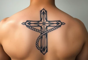 weathered christian cross wrapped in nautical rope with sea waves tattoo idea