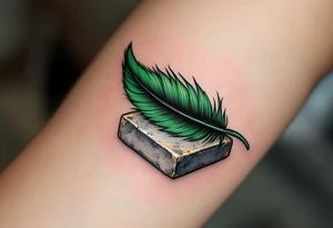 A deep green feather of Ma’at, symbolizing truth and balance, resting on a gray stone tablet. tattoo idea