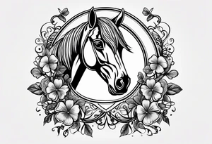 horse shoe with 5 leaf clover inside tattoo idea