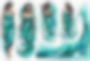 a turquoise water woman standing in the waves tattoo idea
