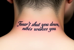 "Fear doesn’t shut you down, it wakes you up" engraved in an elegant script, surrounded by subtle abstract smoke tattoo idea