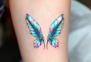 A pair of hummingbird feathers, delicately illustrated in iridescent shades of green, violet, and blue, suggesting joy and freedom. tattoo idea
