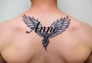 the name Anne in a burning phoenix feather tattoo idea