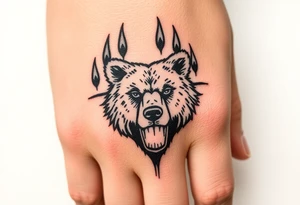 Bears paw with bear face in the middle tattoo idea