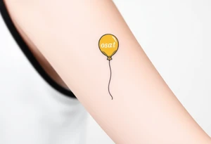 small yellow balloon without string 
with letters osaat on bicep tattoo idea