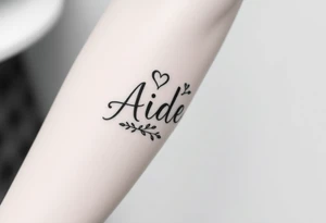 The name Aiden with a love them around it for the forearm tattoo idea