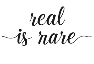 "real is rare" quote in straight line style tattoo idea