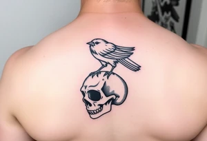Crow standing on skull tattoo idea