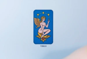 A tarot card featuring the Virgo symbol, with intricate gold detailing and a rich deep blue background tattoo idea