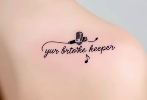 A microphone wire writing the words “My brothers keeper” and music notes tattoo idea