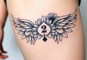sunflower, wings, or halo with a 2 of clubs tattoo idea