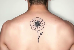 Minimalists marigold flower with g tattoo idea