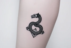 Ouroborous or dragon/serpent/snake eating its own tail in a figure 8 in negative space with geometric patterns on a leg tattoo design tattoo idea