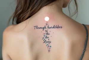 Flowing in teal ink across the spine, “Through hardships to the stars” is crowned with a glowing white moon. tattoo idea
