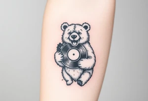 happy bear holding a vinyl record tattoo idea