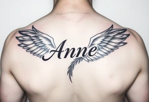 the name Anne in a phoenix feather tattoo idea