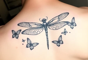 dragonfly surrounded by small butterflies tattoo idea