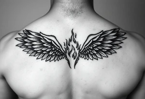 wings but half is made of fire tattoo idea