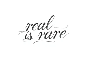 "real is rare" quote in sleky style tattoo idea