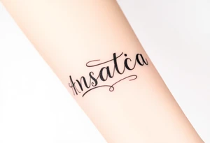 Anastacia in old English cursive font tattoo idea