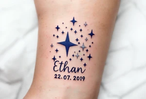 Ethan 22. 07. 2019 – Bold navy blue and silver stars scattered across a night sky, with Ethan's birthdate in a white, handwritten font. tattoo idea
