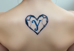 A shattered glass heart with the letter "Y" in blue, symbolizing love’s fragility and strength. tattoo idea